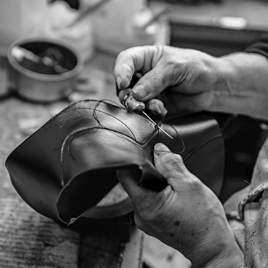 Upper stitched to welt by hand