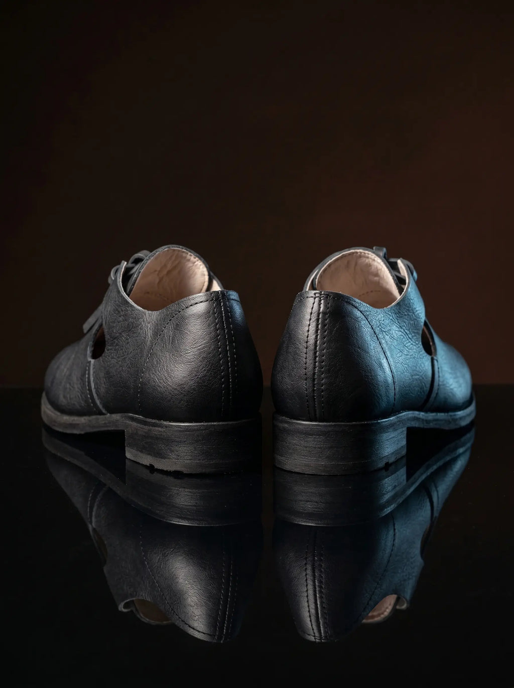 Pair of black handcrafted open latchet shoes — genuine leather, made to order — Noirtide historical footwear