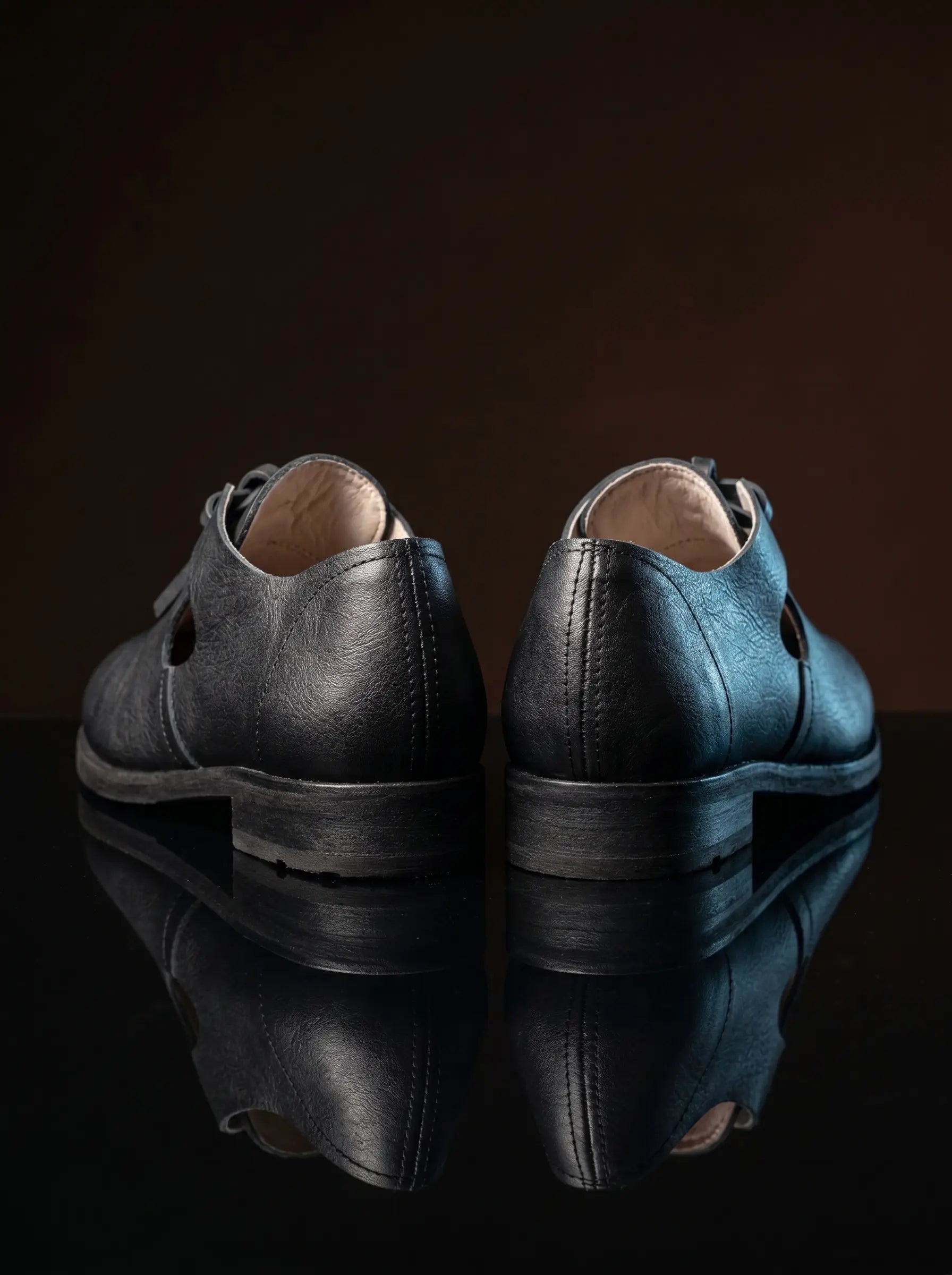 Pair of black handcrafted open latchet shoes — genuine leather, made to order — Noirtide historical footwear