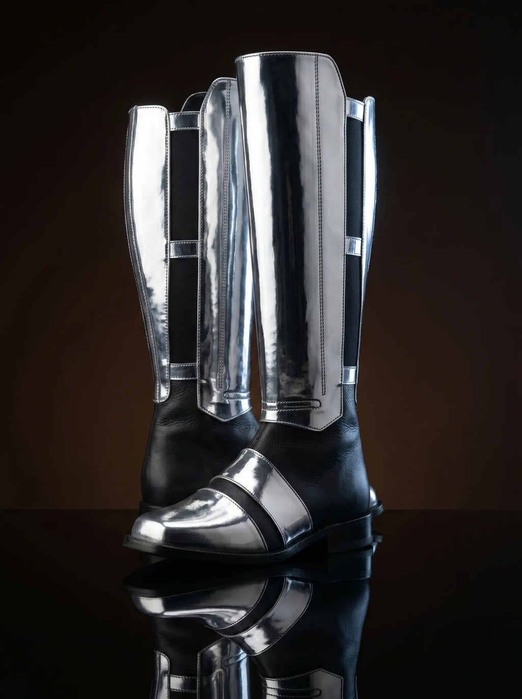 Full side view of black leather Noirtide Darth Revan cosplay boot — knee-high, single wide strap, low heel