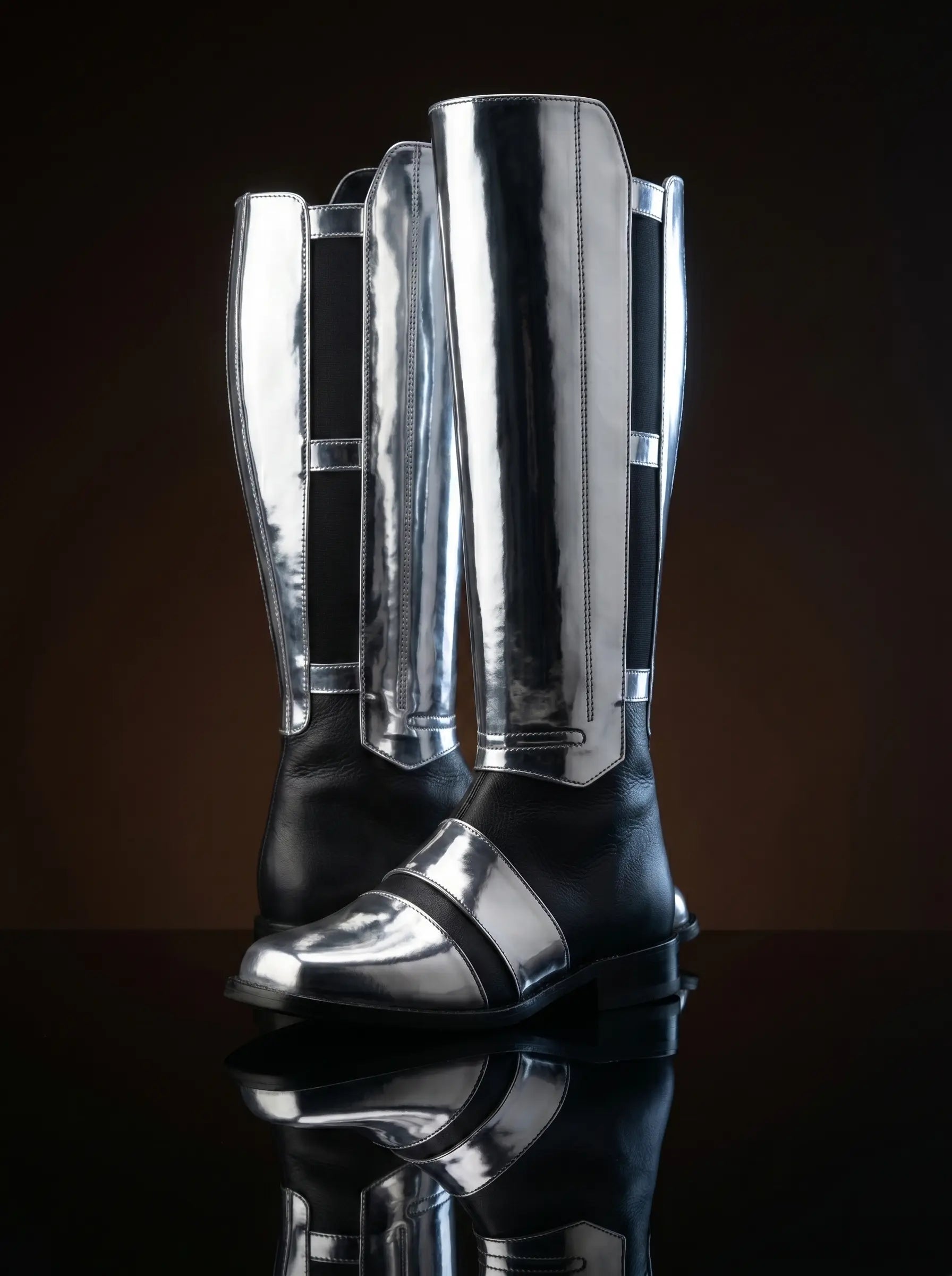 Full side view of black leather Noirtide Darth Revan cosplay boot — knee-high, single wide strap, low heel
