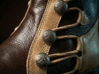 Close-up of brown leather 17-inch shaft on Noirtide Richard Cypher boots — genuine leather lace-up cosplay footwear