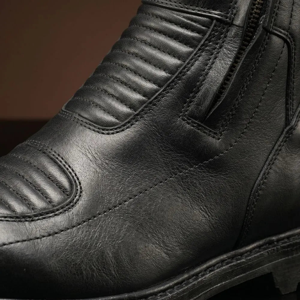 High-polish leather finish on NOIRTIDE Batman Returns boots