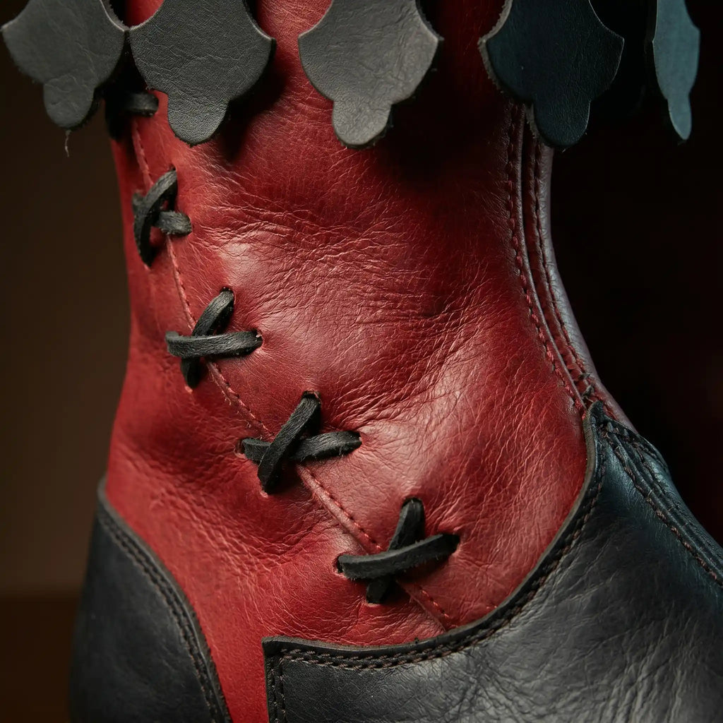 Black leather texture on NOIRTIDE Viking lace-up medieval boots