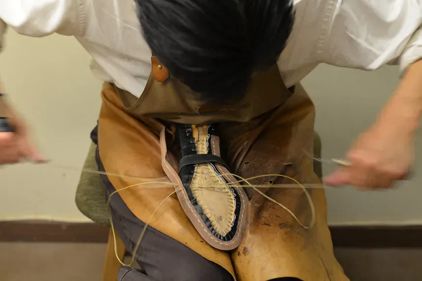 Upper stitched to welt by hand