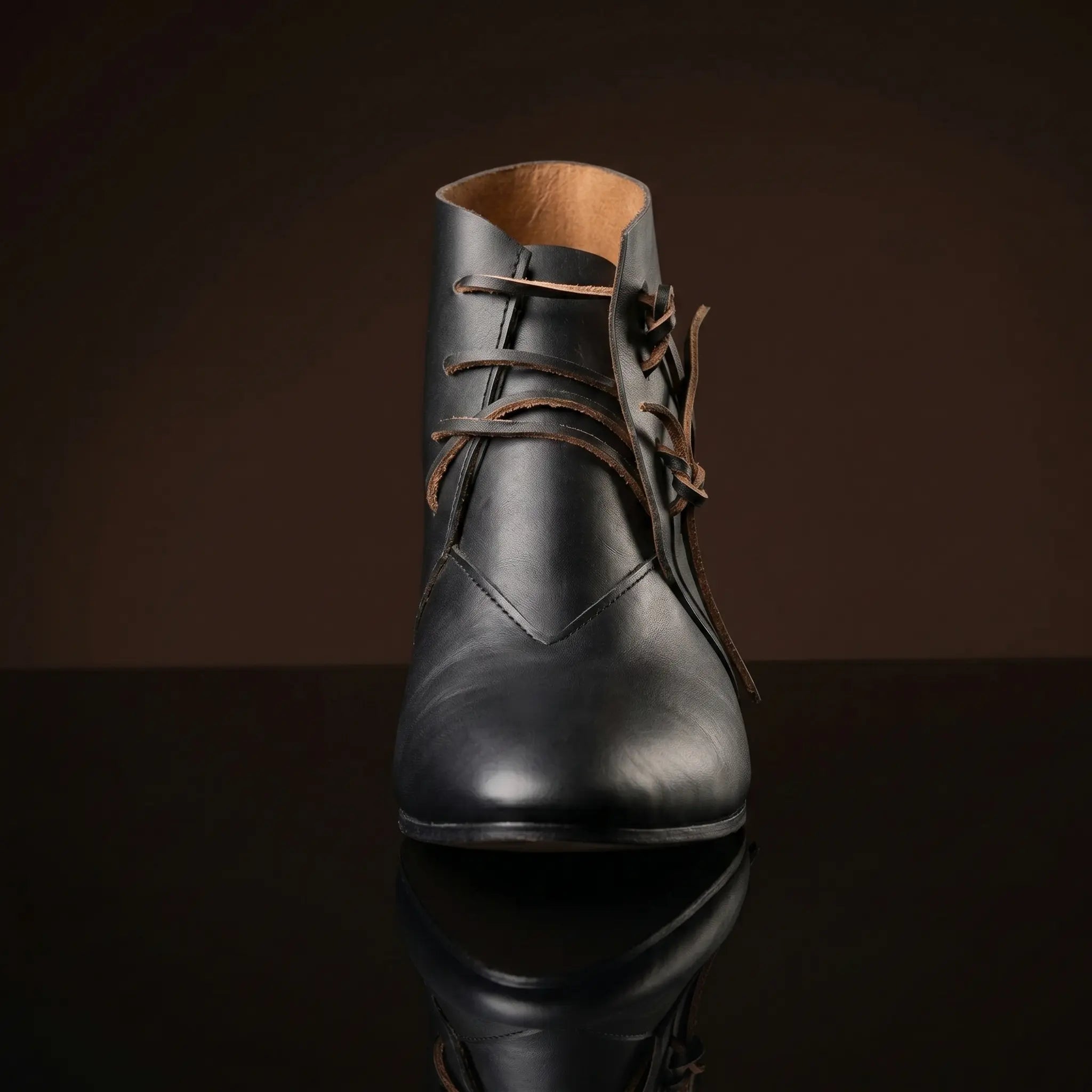 Front view of NOIRTIDE custom medieval peasant leather boots
