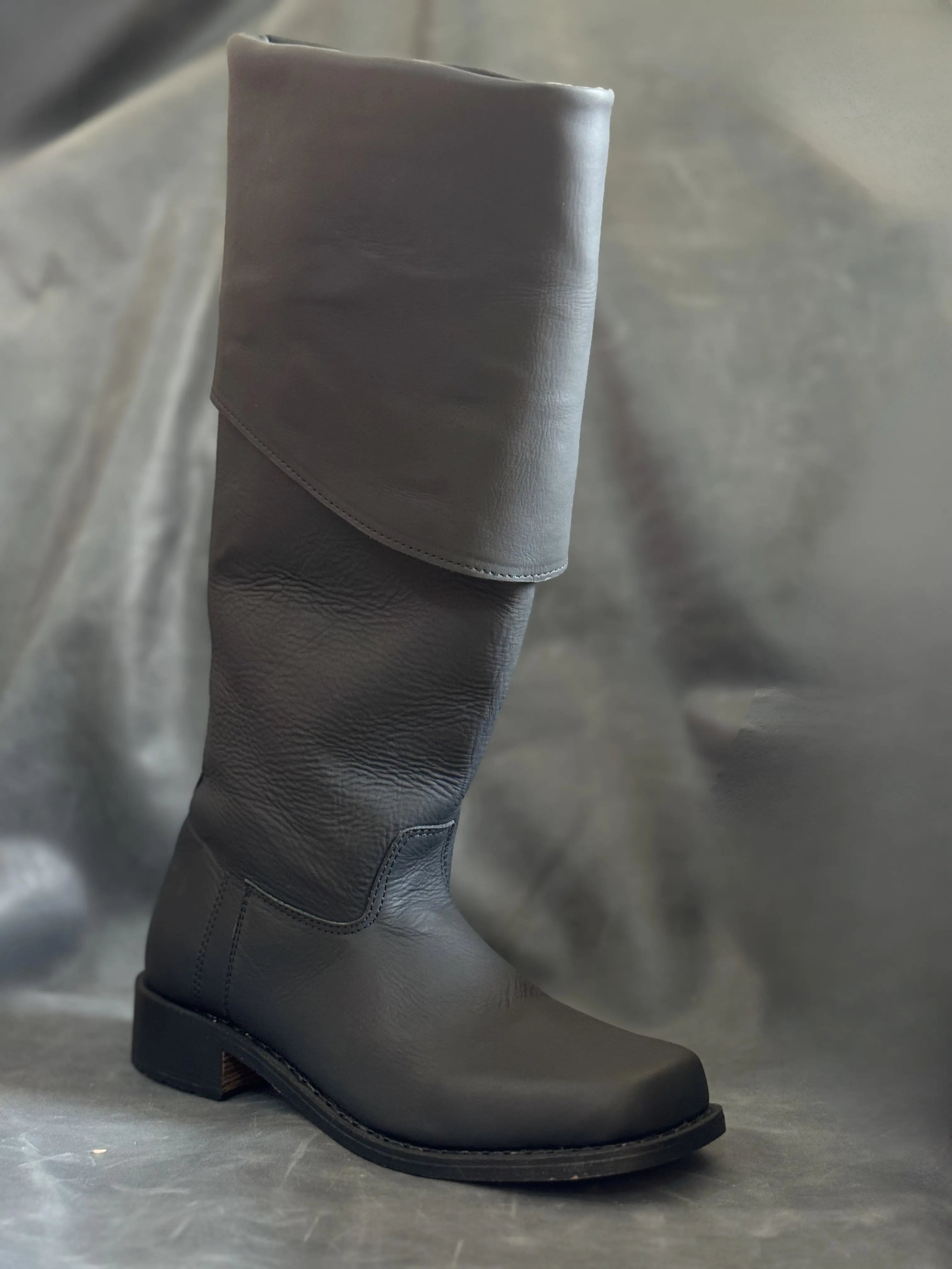 Noirtide Jamie Fraser boot with cuff folded down for riding — matt black leather, flat sole, 18th century Highland